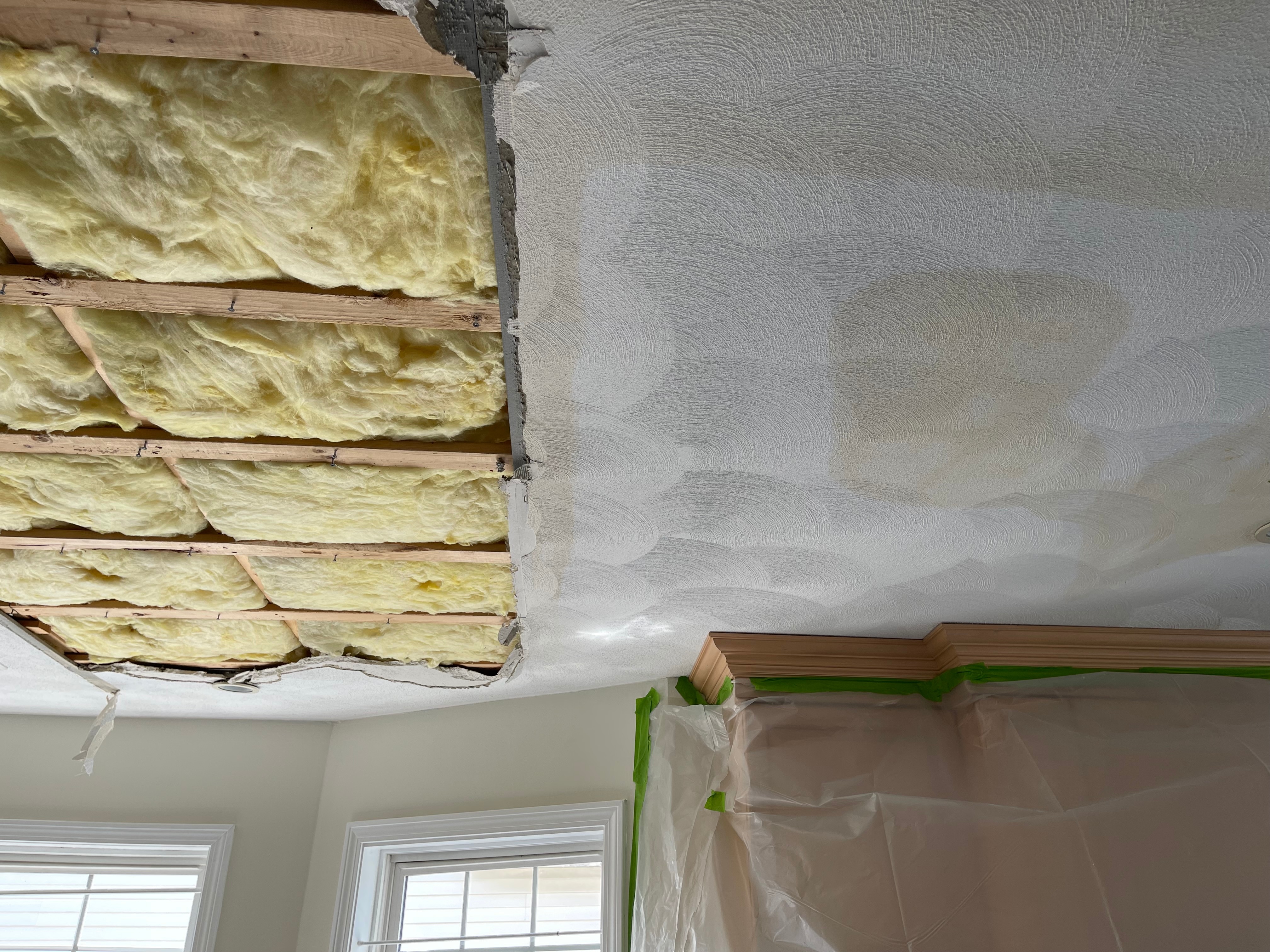 Water damage restoration - insulation replacement